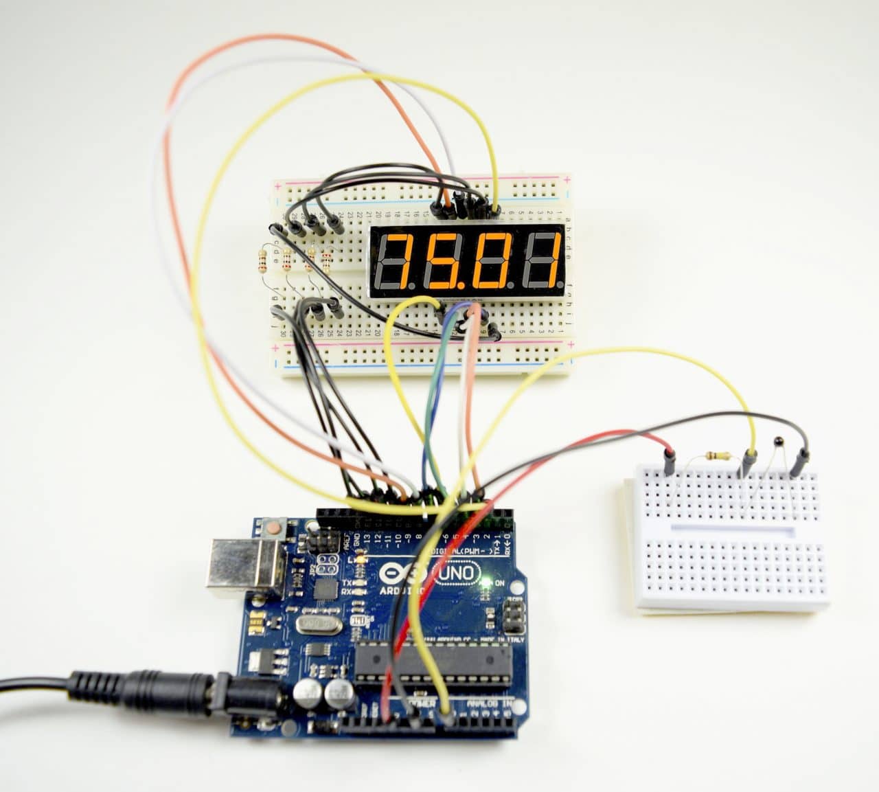 How to Set up Seven Segment Displays on the Arduino - Circuit Basics